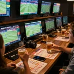 Players engaging in responsible sports betting at 789bet, analyzing statistics and enjoying the atmosphere.