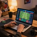 Engaging with LU88 sports betting app on a laptop during a live game.