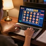 Engaging with Paris888 online slots, a player strategizing at a cozy home desk.